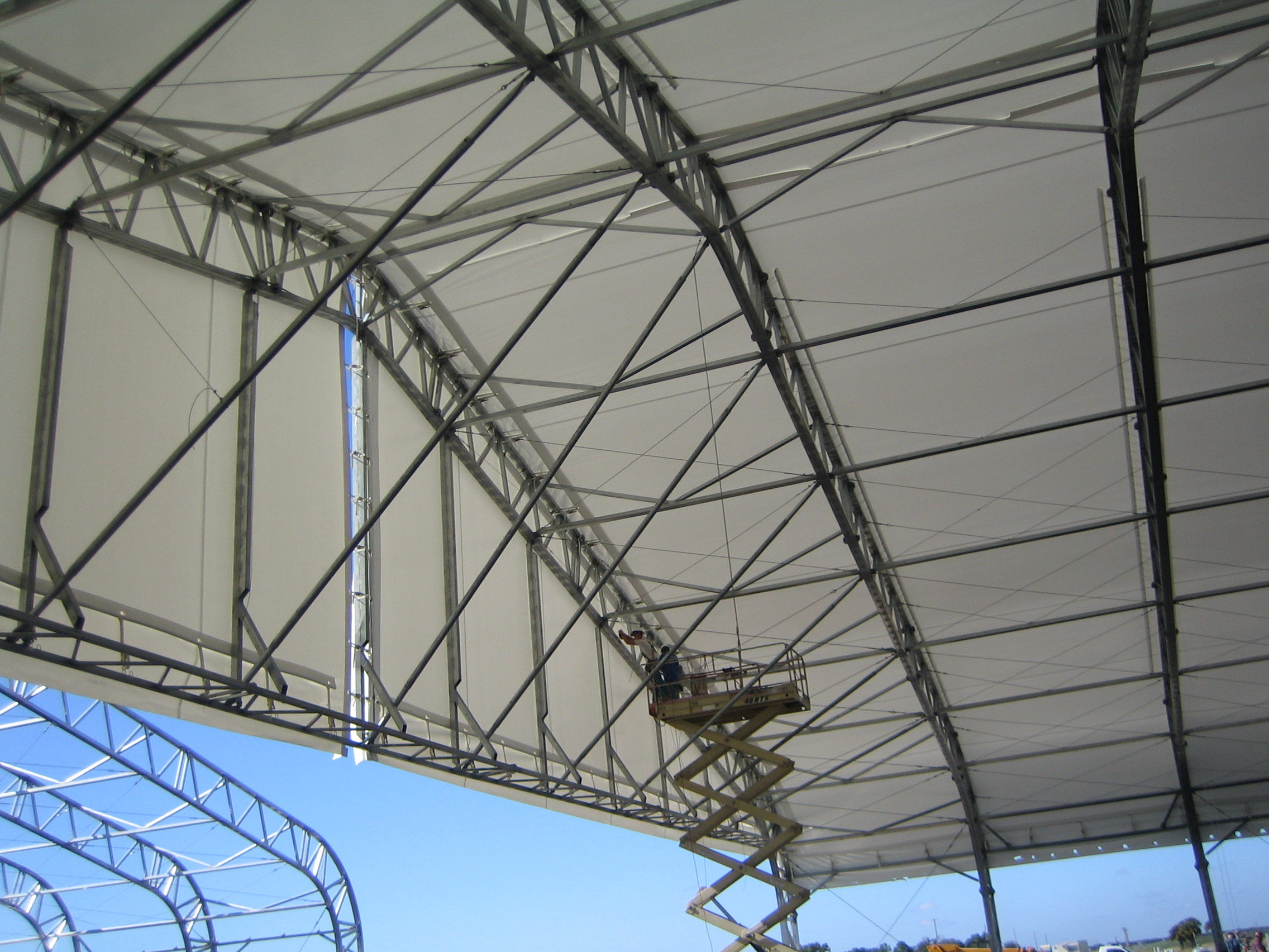 Large fabric panels installed on a steel frame structure